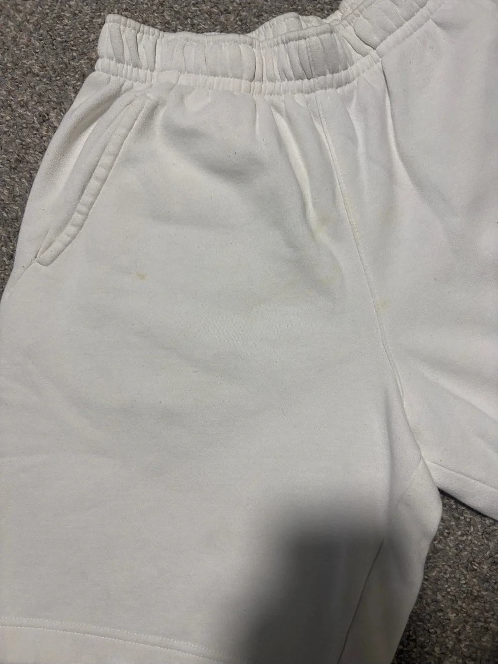 Nike White Athletic Shorts with Black Swoosh